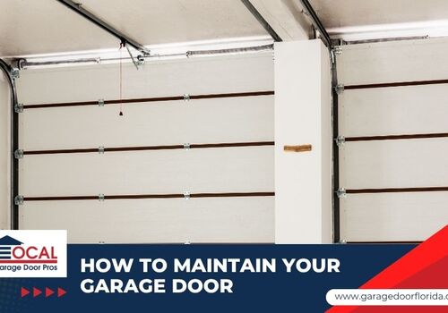 Interior view of an open sectional garage door showing the track, rollers, and hinges — featured image for the "How to Maintain Your Garage Door the Right Way" blog post by Local Garage Door Pros.