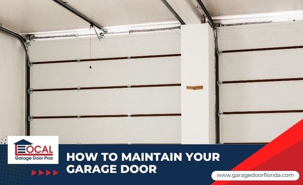 Interior view of an open sectional garage door showing the track, rollers, and hinges — featured image for the "How to Maintain Your Garage Door the Right Way" blog post by Local Garage Door Pros.