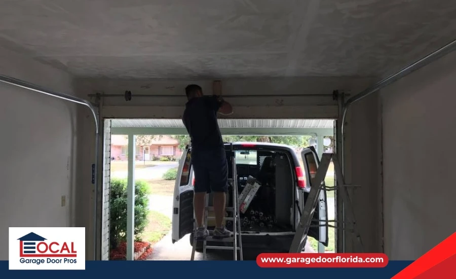 Professional repairing garage door mechanism
