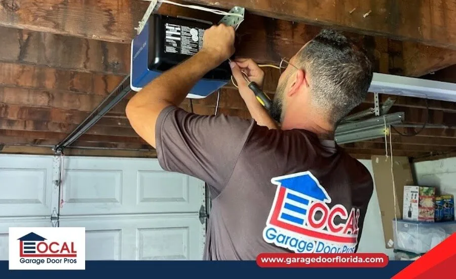 local garage door pros technician inspecting garage door opener