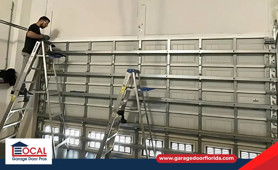 Inspecting a garage door roller for wear and tear