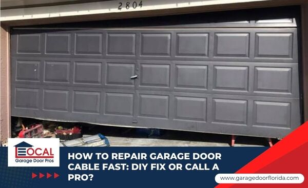 Frayed garage door cable close-up.