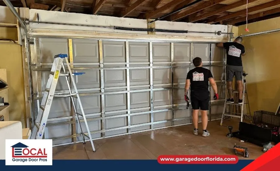 Local Garage Door Pros Technician repairing garage door