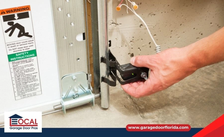 Cleaning garage door photo-eye safety sensor