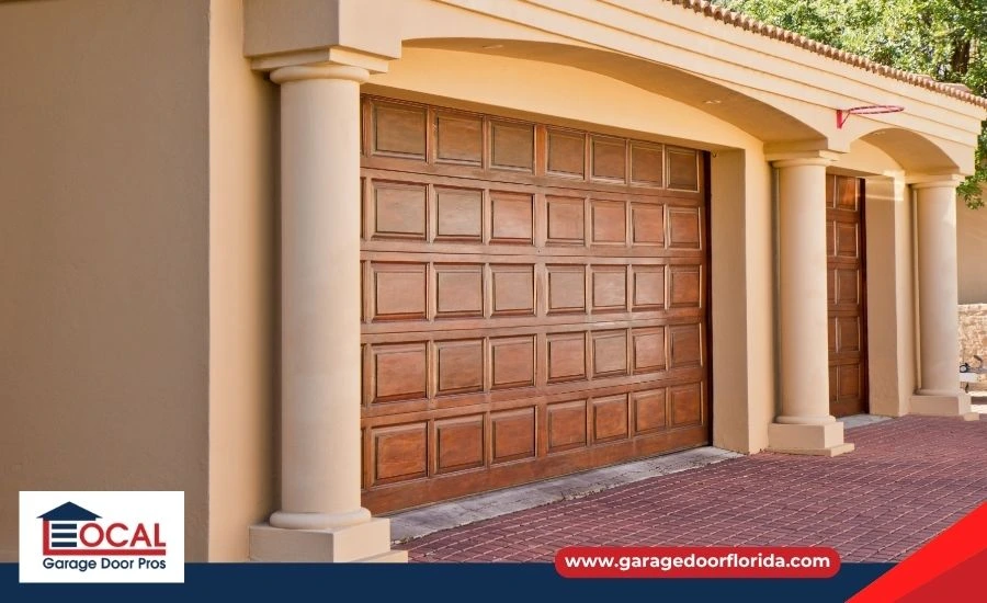 A stunning modern home at dusk with a warm, glowing wood-plank residential garage door, showcasing high-end curb appeal and style.