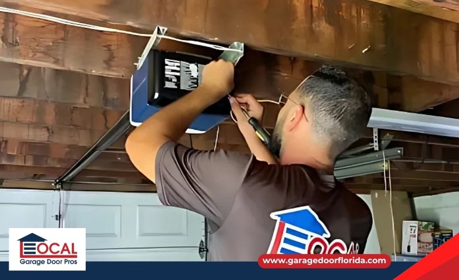 technician repairing a garage door opener