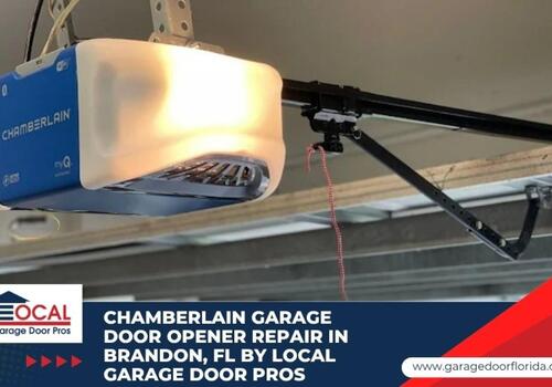Garage Door Repair Tips Brandon FL Garage Door Opener Solut - Local Garage Door Pros An illuminated Chamberlain myQ smart garage door opener unit mounted on a ceiling, glowing brightly with an app download tag hanging from it.