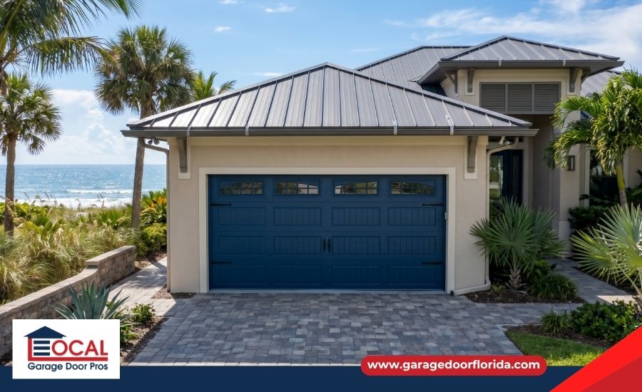 A durable, wind-rated exterior garage door installed on a coastal home