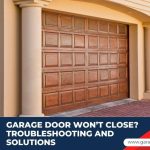 A homeowner looking concerned at a partially open residential garage door that is stuck and won't close.