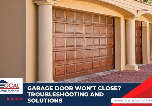 garage door wont close - Local Garage Door Pros A homeowner looking concerned at a partially open residential garage door that is stuck and won't close.